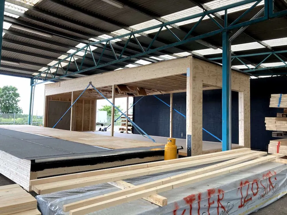 timber factory installing wood sensors on the materials